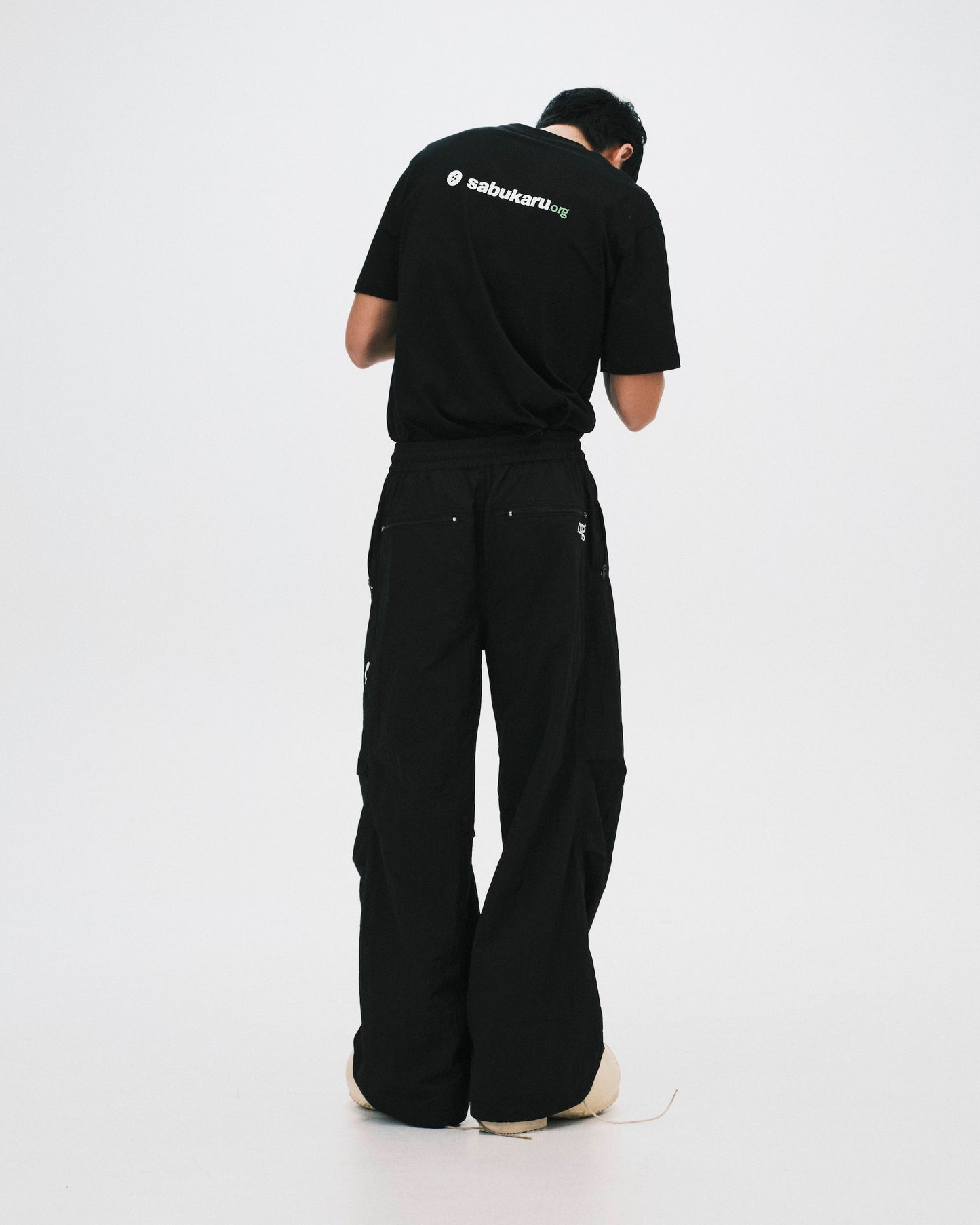 SABUKARU_sabukaru Citizen Track Pants (Black)